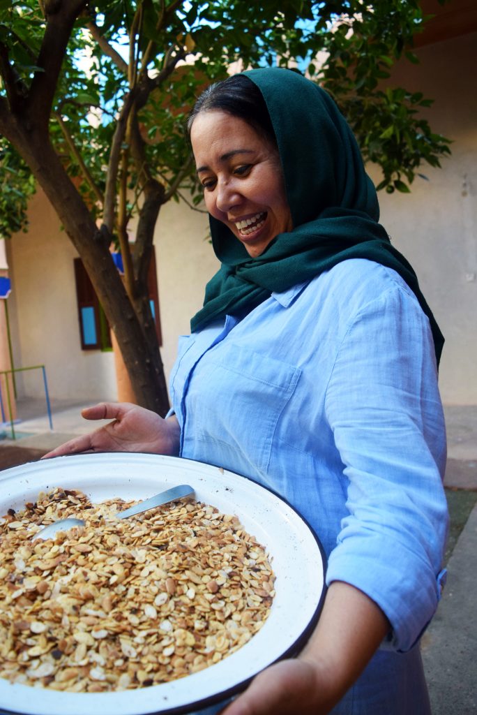 EBM - women holding roasted argan kernels